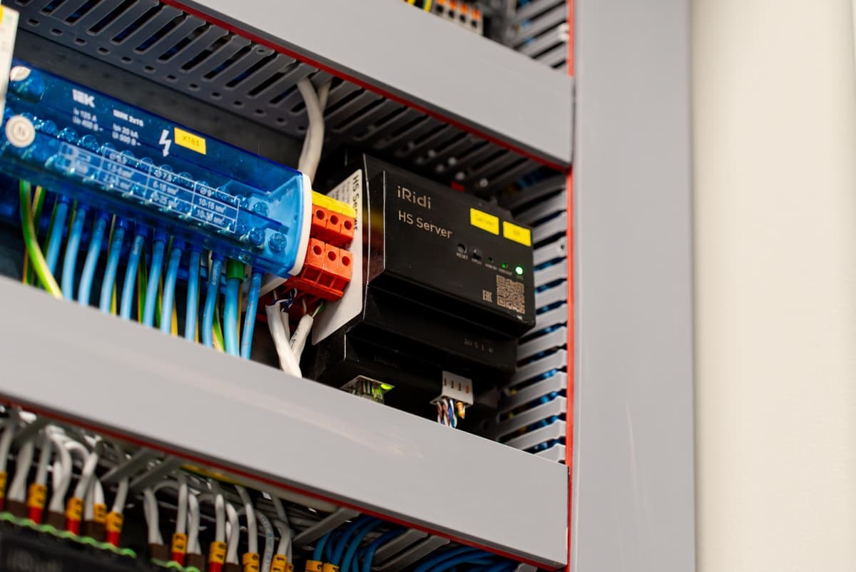 Industrial control cabinet with terminal blocks and wiring